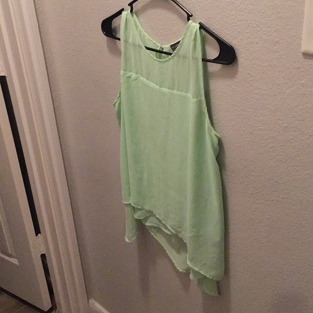 Bright short sleeveless summer blouse